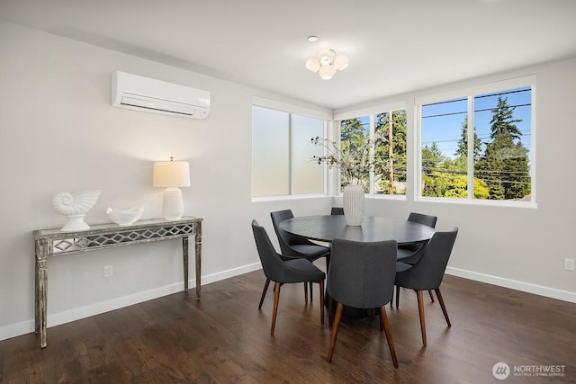 13329 1st Ave NE, Seattle, WA 98125 - dining area with an AC wall unit, baseboards, and wood finished floors