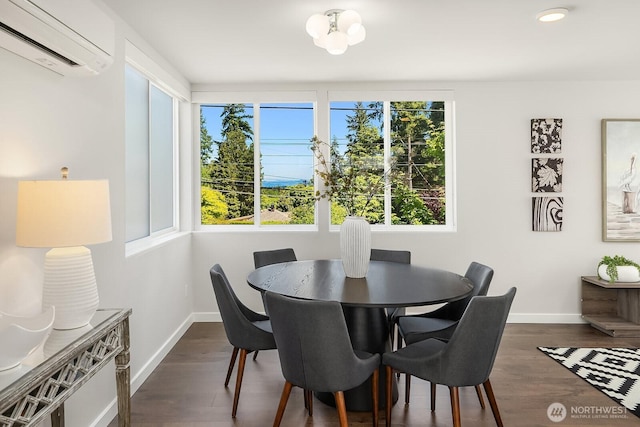 13329 1st Ave NE, Seattle, WA 98125 - dining space featuring a wall mounted AC, baseboards, dark wood-style floors, and recessed lighting