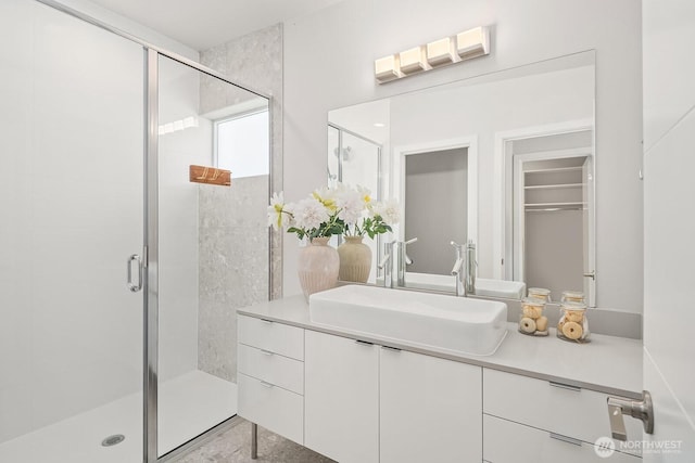 13329 1st Ave NE, Seattle, WA 98125 - bathroom featuring a shower stall, vanity, and a spacious closet