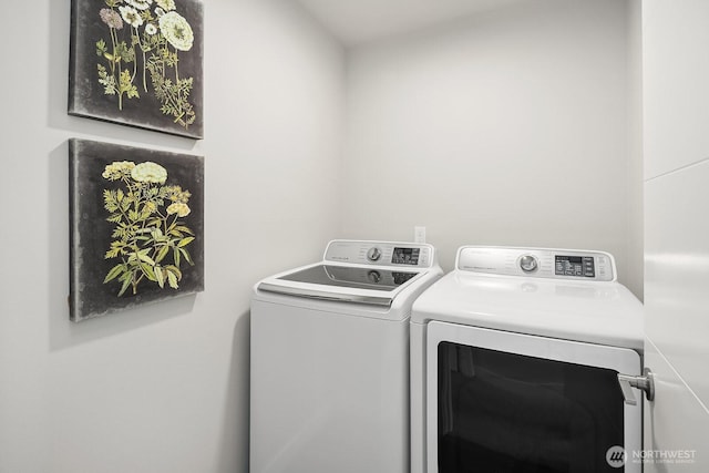 13329 1st Ave NE, Seattle, WA 98125 - laundry room featuring washer and clothes dryer