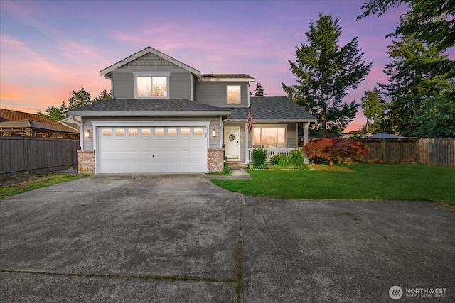 20111 74th Avenue Ct E, Spanaway, WA 98387 - traditional-style house featuring driveway, an attached garage, brick siding, and a shingled roof