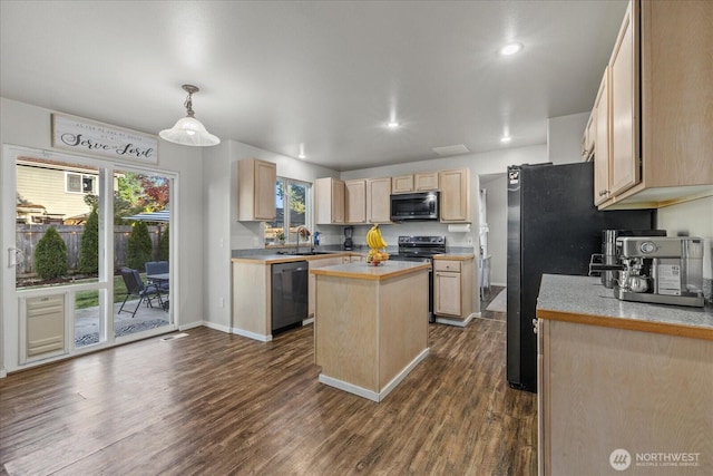 20111 74th Avenue Ct E, Spanaway, WA 98387 - kitchen featuring stainless steel appliances, a sink, a kitchen island, light brown cabinets, and light countertops