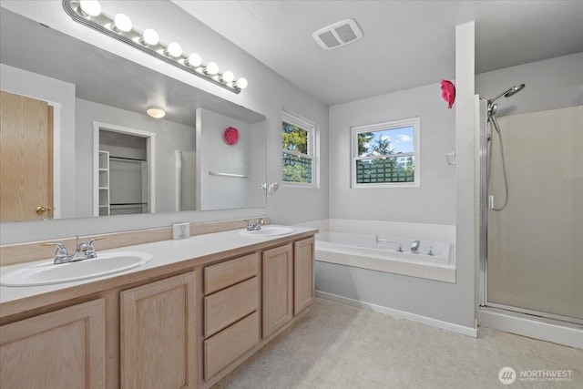 20111 74th Avenue Ct E, Spanaway, WA 98387 - bathroom with a shower stall, a garden tub, and double vanity