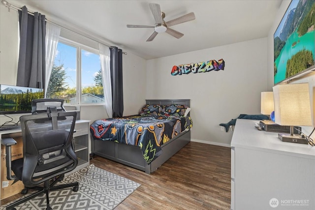 20111 74th Avenue Ct E, Spanaway, WA 98387 - bedroom featuring wood finished floors, an office area, baseboards, and a ceiling fan