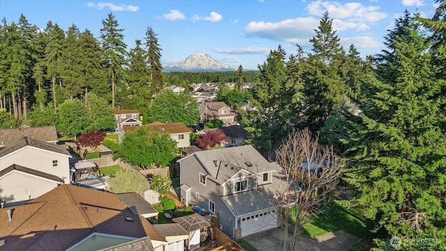 20111 74th Avenue Ct E, Spanaway, WA 98387 - aerial perspective of suburban area with a mountain backdrop