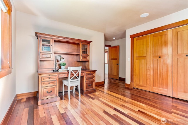 3276 Spyglass Dr, Bellingham, WA 98226 - office featuring light wood-style flooring, baseboards, and built in desk
