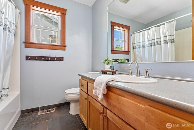 3276 Spyglass Dr, Bellingham, WA 98226 - bathroom with vanity, toilet, baseboards, tile patterned flooring, and shower / bath combo