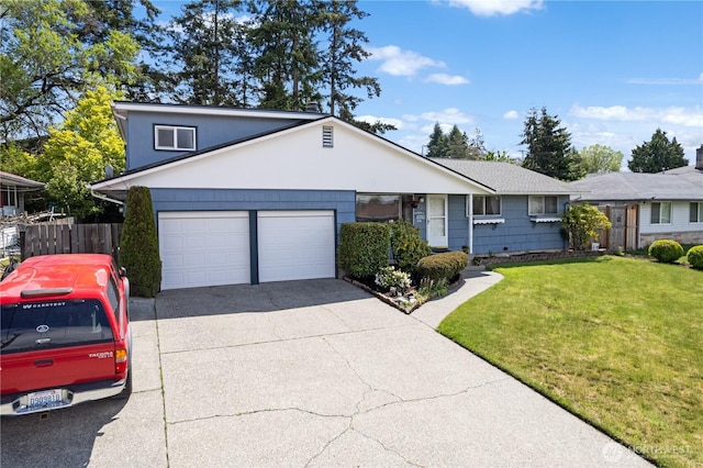7425 S Alaska St, Tacoma, WA 98408 - view of front of property featuring a garage and concrete driveway