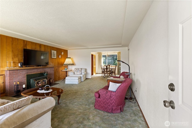 7425 S Alaska St, Tacoma, WA 98408 - living room featuring carpet floors, a fireplace, wood walls, and a textured ceiling