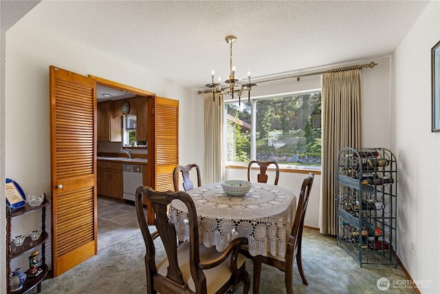 7425 S Alaska St, Tacoma, WA 98408 - carpeted dining area with a chandelier, a sink, and a textured ceiling