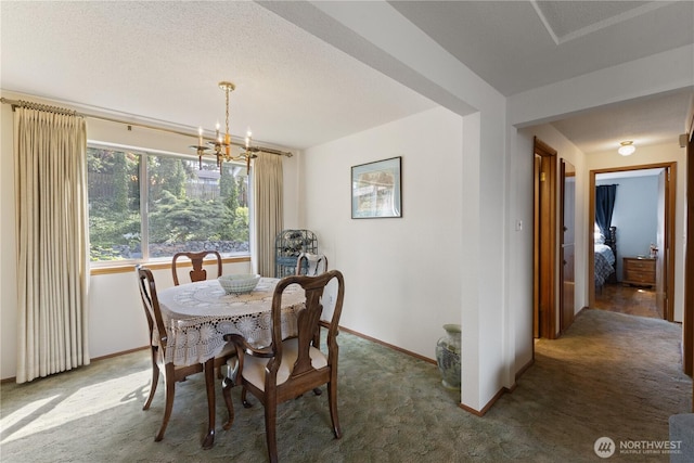 7425 S Alaska St, Tacoma, WA 98408 - carpeted dining area featuring baseboards and a chandelier