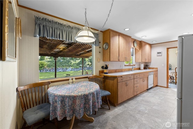 7425 S Alaska St, Tacoma, WA 98408 - kitchen featuring dishwasher, freestanding refrigerator, light countertops, a sink, and recessed lighting