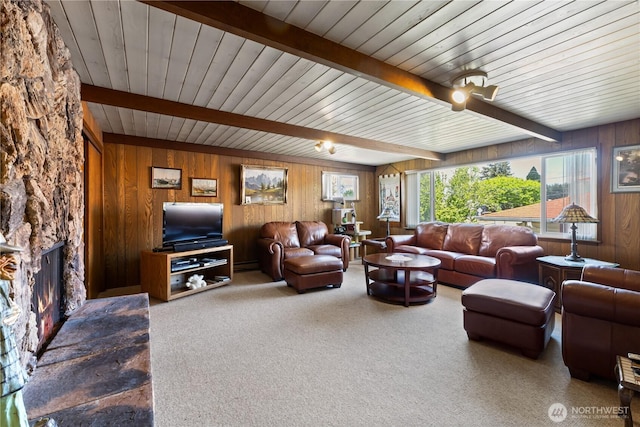 7425 S Alaska St, Tacoma, WA 98408 - living area featuring wooden walls, carpet, a fireplace, a baseboard radiator, and wood ceiling with exposed beams