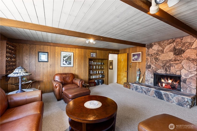 7425 S Alaska St, Tacoma, WA 98408 - carpeted living area featuring wood ceiling with exposed beams, wood walls, and a fireplace