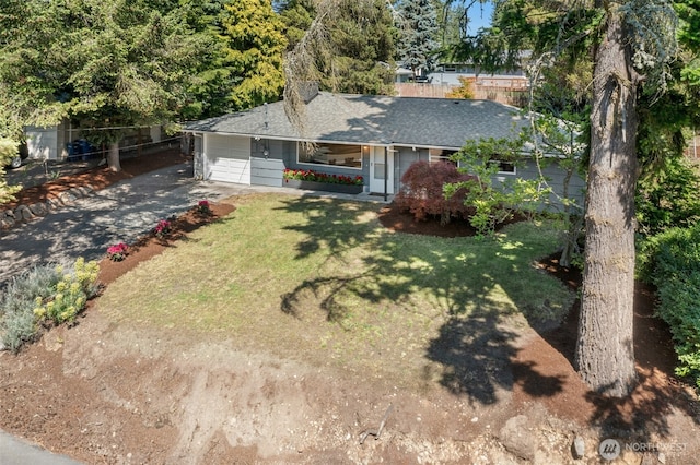 20608 1st Ave S, Des Moines, WA 98198 - view of front of house with a garage, driveway, and roof with shingles
