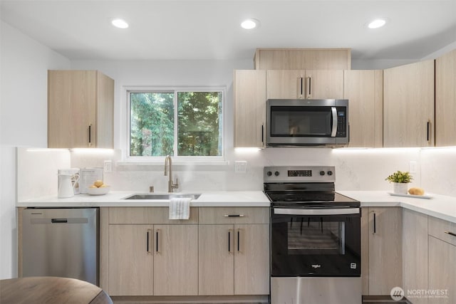 2401 155th Street Ct E, Tacoma, WA 98445 - kitchen with appliances with stainless steel finishes, light brown cabinets, and recessed lighting