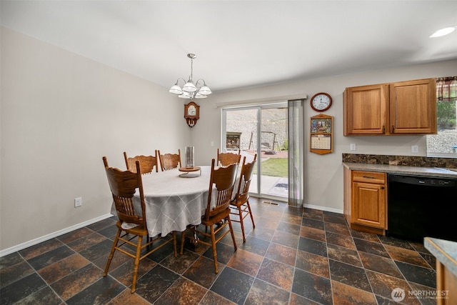 6132 Entiat River Rd, Entiat, WA 98822 - dining room featuring baseboards, a chandelier, and stone tile flooring