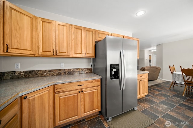 6132 Entiat River Rd, Entiat, WA 98822 - kitchen featuring stainless steel fridge, dark countertops, dark stone finish floors, recessed lighting, and baseboards