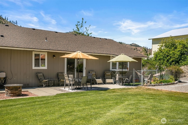 6132 Entiat River Rd, Entiat, WA 98822 - rear view of property with a patio area, roof with shingles, and a fire pit