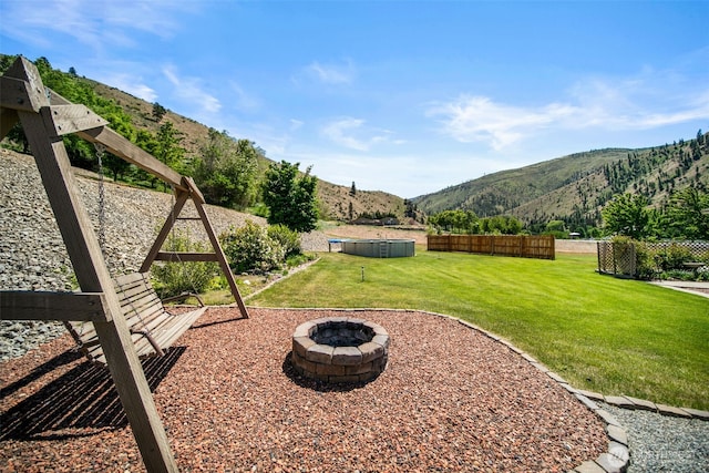 6132 Entiat River Rd, Entiat, WA 98822 - view of yard with a mountain view and an outdoor fire pit