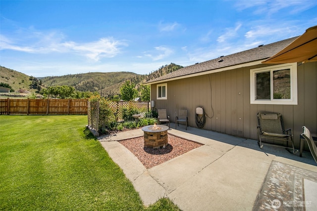 6132 Entiat River Rd, Entiat, WA 98822 - view of yard featuring a mountain view, a fire pit, and a patio