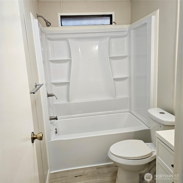 7031 NE 175th St Unit 20, Kenmore, WA 98028 - full bath with toilet, vanity, wood finished floors, and shower / washtub combination