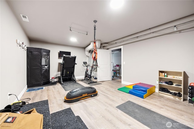 9968 Griffith Pl, Entiat, WA 98822 - workout room featuring wood finished floors and baseboards