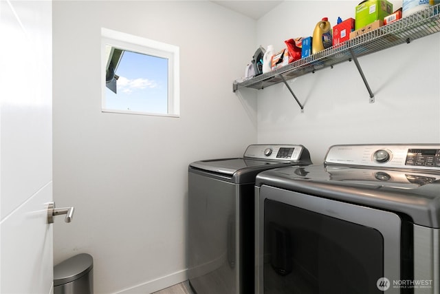 2736 SW Holden St, Seattle, WA 98126 - laundry room featuring independent washer and dryer and baseboards