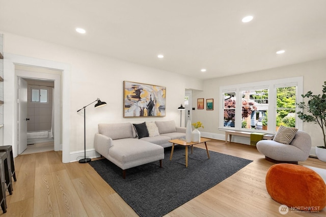 4607 1st Ave NE, Seattle, WA 98105 - living area with recessed lighting, light wood-type flooring, and baseboards