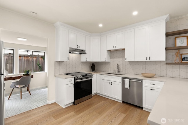 4607 1st Ave NE, Seattle, WA 98105 - kitchen with stainless steel appliances, a sink, open shelves, under cabinet range hood, and light wood-style flooring