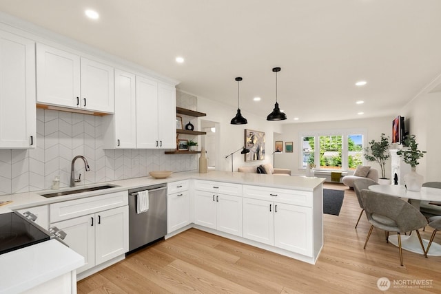 4607 1st Ave NE, Seattle, WA 98105 - kitchen with stainless steel dishwasher, a sink, open shelves, open floor plan, and recessed lighting