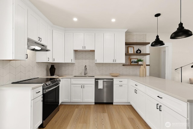 4607 1st Ave NE, Seattle, WA 98105 - kitchen featuring dishwasher, a sink, under cabinet range hood, range with electric cooktop, and a peninsula