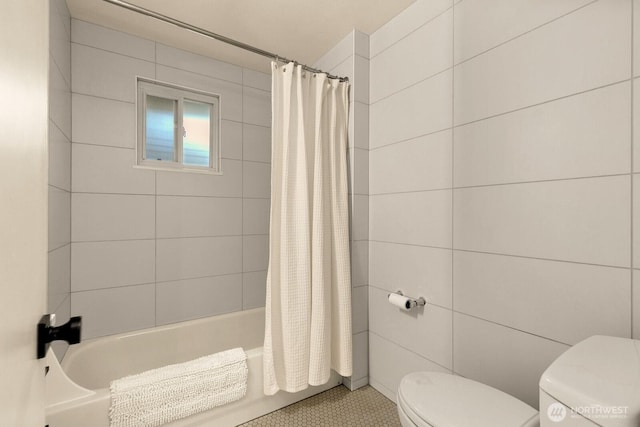 4607 1st Ave NE, Seattle, WA 98105 - bathroom featuring toilet, shower / bath combo with shower curtain, and tile patterned flooring