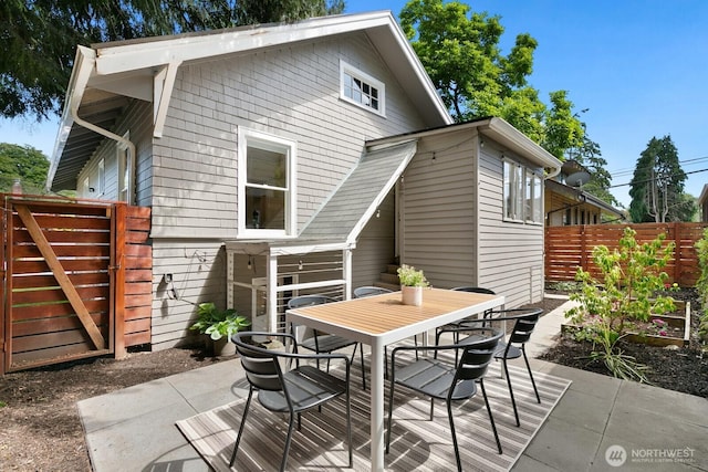 4607 1st Ave NE, Seattle, WA 98105 - back of house featuring outdoor dining area and a patio area