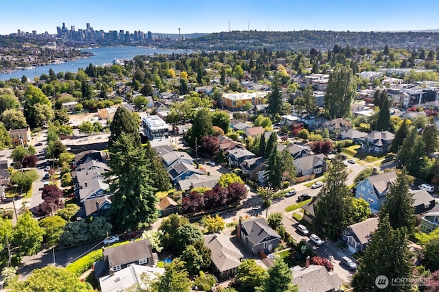 4607 1st Ave NE, Seattle, WA 98105 - aerial view of property and surrounding area featuring a large body of water and nearby suburban area