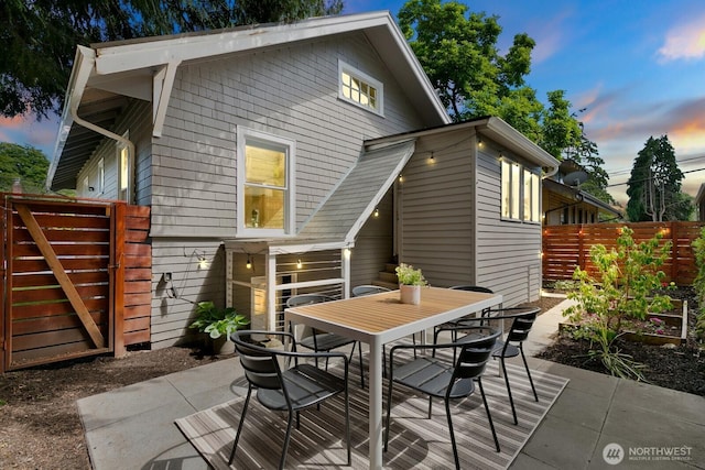 4607 1st Ave NE, Seattle, WA 98105 - back of property featuring outdoor dining space and a patio area