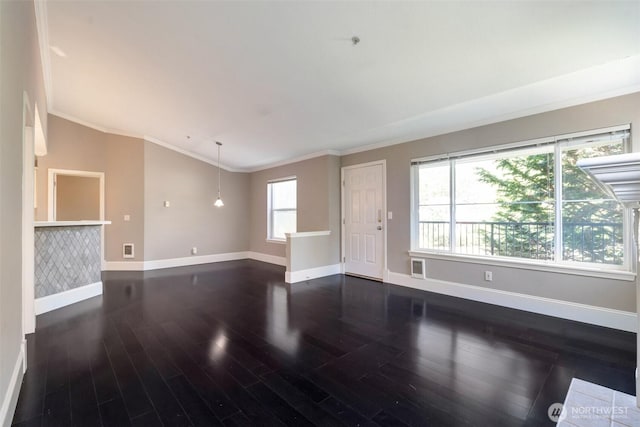 2198 Palisade Blvd Unit C2, Dupont, WA 98372 - unfurnished living room with dark wood-style floors, baseboards, crown molding, and lofted ceiling