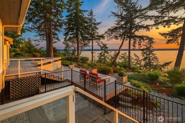 2 Edgewater Dr, Camano Island, WA 98282 - view of patio / terrace with stairway and a deck with water view