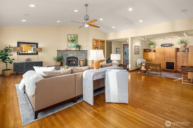 2 Edgewater Dr, Camano Island, WA 98282 - living room with ceiling fan, wood finished floors, vaulted ceiling, and recessed lighting