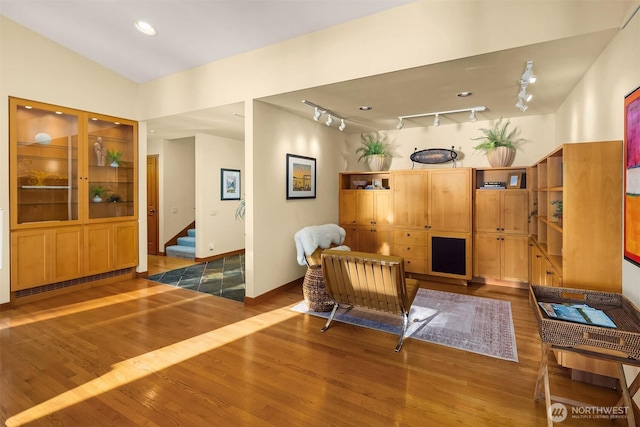 2 Edgewater Dr, Camano Island, WA 98282 - living area featuring wood finished floors, track lighting, and stairway