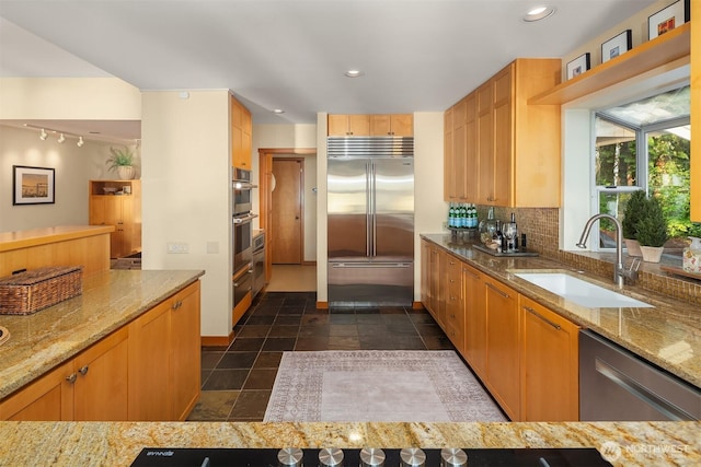 2 Edgewater Dr, Camano Island, WA 98282 - kitchen featuring stainless steel appliances, light stone counters, recessed lighting, and backsplash