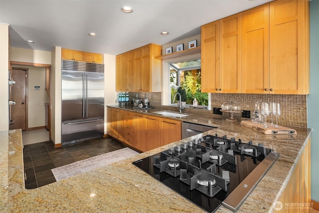 2 Edgewater Dr, Camano Island, WA 98282 - kitchen with appliances with stainless steel finishes, backsplash, light stone counters, recessed lighting, and dark stone finish flooring