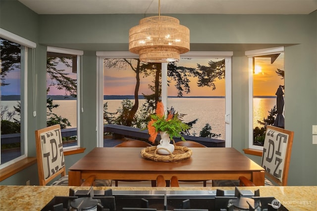 2 Edgewater Dr, Camano Island, WA 98282 - dining space with a chandelier and a water view