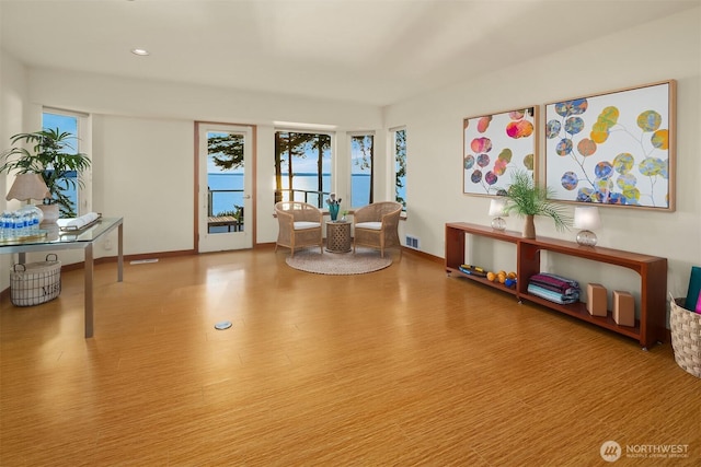 2 Edgewater Dr, Camano Island, WA 98282 - living area with healthy amount of natural light, wood finished floors, and recessed lighting