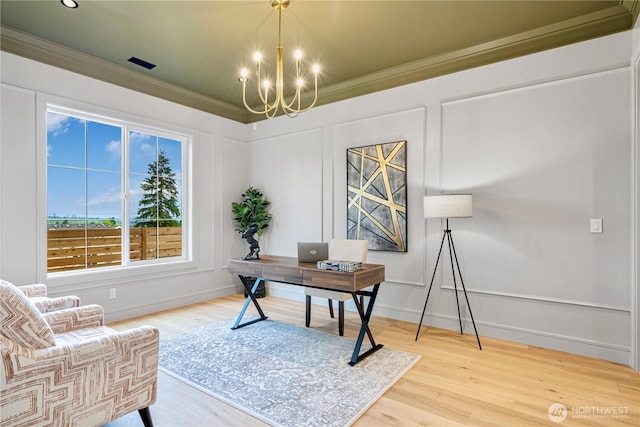 12811 SE 44th Pl, Bellevue, WA 98006 - office area featuring a chandelier, wood finished floors, crown molding, and baseboards