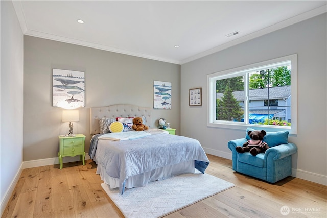12811 SE 44th Pl, Bellevue, WA 98006 - bedroom featuring ornamental molding, baseboards, light wood-type flooring, and recessed lighting