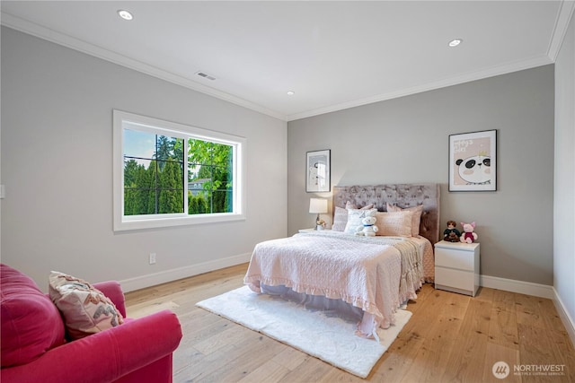 12811 SE 44th Pl, Bellevue, WA 98006 - bedroom featuring baseboards, crown molding, light wood finished floors, and recessed lighting