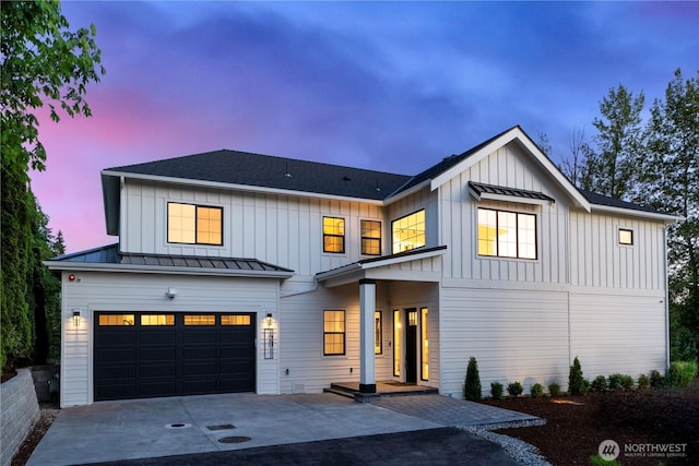 12811 SE 44th Pl, Bellevue, WA 98006 - modern farmhouse style home featuring a standing seam roof, board and batten siding, an attached garage, concrete driveway, and metal roof