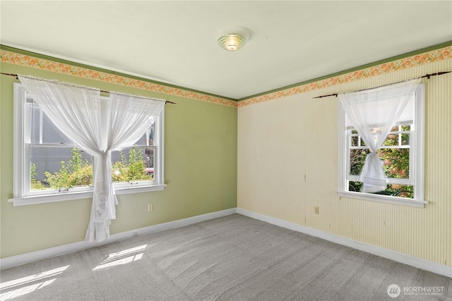 912 Highland Dr, Wenatchee, WA 98801 - spare room featuring healthy amount of natural light, carpet floors, and baseboards