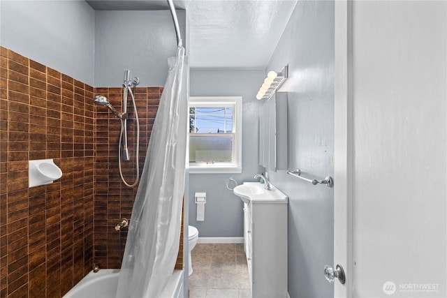 912 Highland Dr, Wenatchee, WA 98801 - full bathroom featuring vanity, shower / tub combo, tile patterned flooring, and toilet